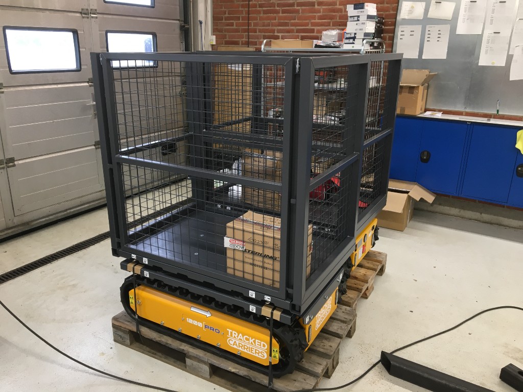 Tracked Carriers 1200 PRO with mesh cage loaded on a pallet